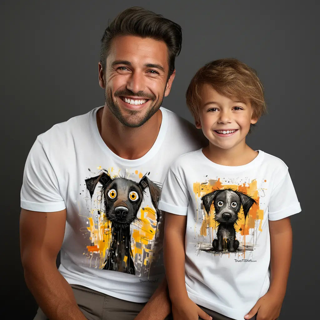 a father and son wearing matching t-shirts featuring an adult dog and a puppy